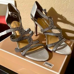 Brand new. Gianni Bini strappy rhinestone heels. Never worn. Size 7.5.